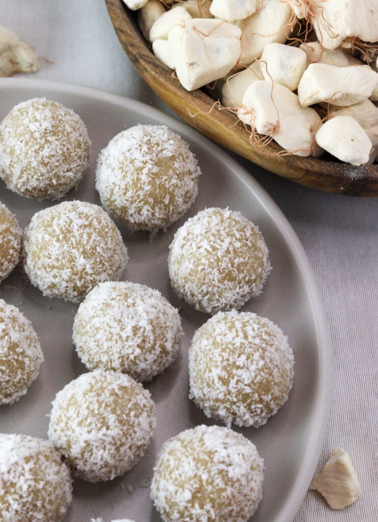 delicious coconut baobab bites with baobab pulp in the background